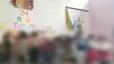 Деца мятат гюбеци, нагиздени в народни носии