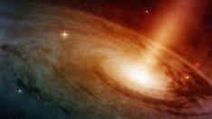 Астрономи наблюдаваха как супермасивна черна дупка разкъсва и поглъща звезда