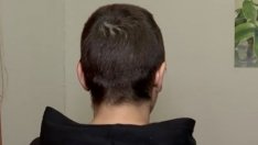 Жена е бита и подстригана пред децата си