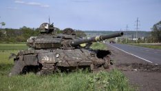 Украинка изуми света! Видя чаршафите си на снимка, върху руски танк са