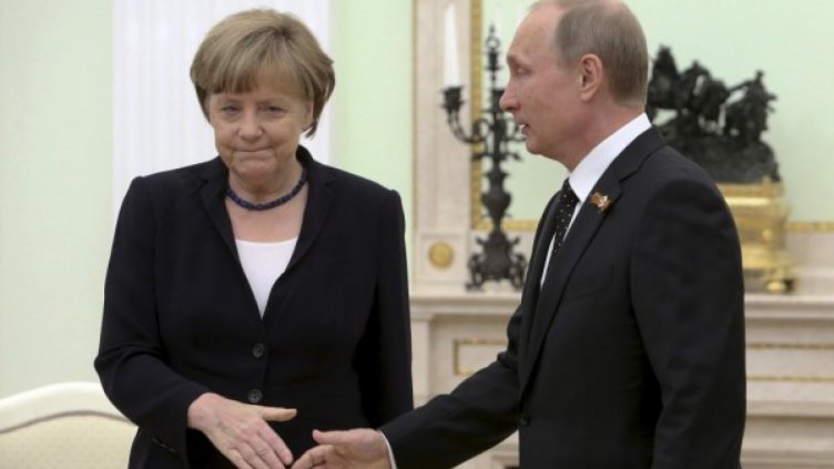 Ангела Меркел и Владимир Путин. Снимка: архив, Reuters