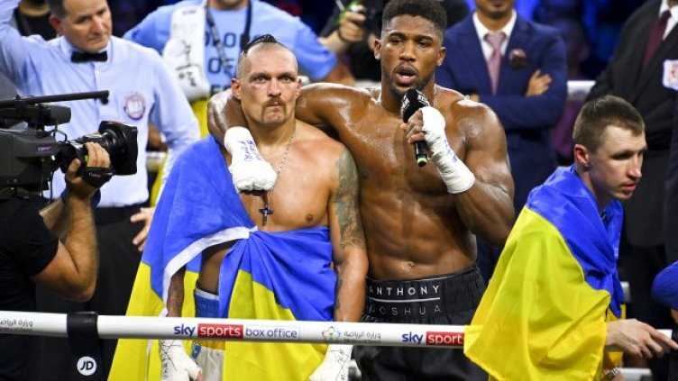 Усик успя да защити титлите си в мегабслъсъка с Джошуа