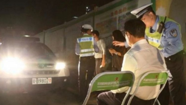 Как наказва китайският КАТ?