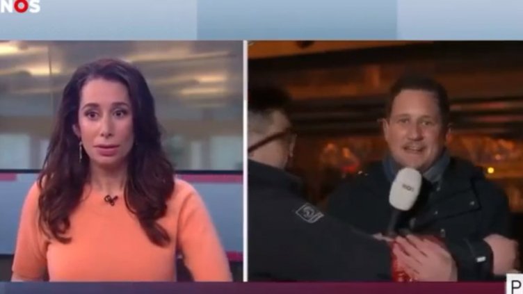 Екшън в Пекин: Охранител нападна журналист по време на пряко включване (ВИДЕО)